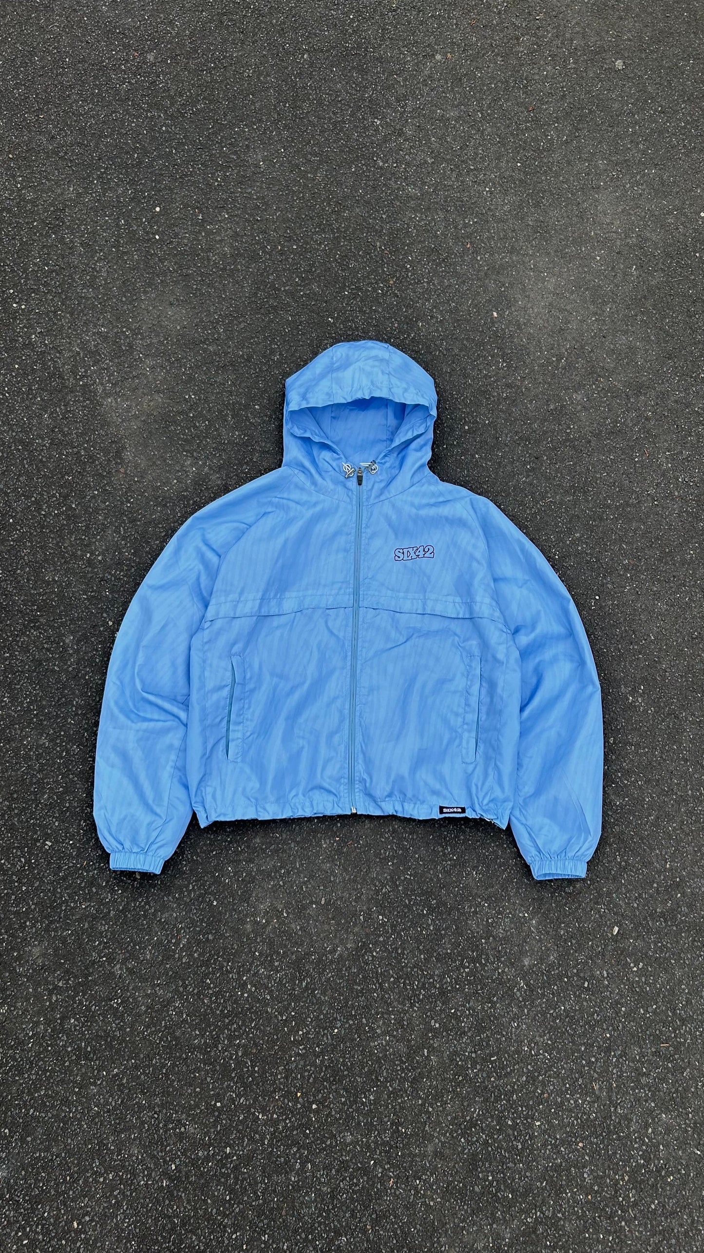 WINDBREAKER LIGHT BLUE